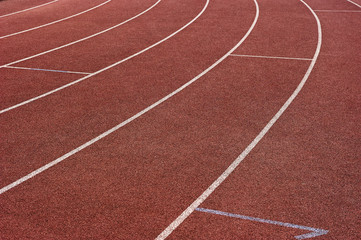 Fototapeta premium Red running track in stadium. Part of red running track 