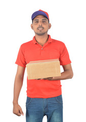 Happy delivery man holding carton box in uniform