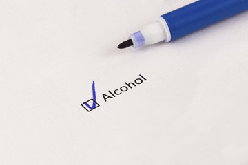 Questionnaire, survey. Checked box with inscription Alcohol and blue marker