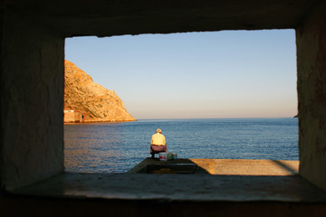 View to the Aegean sea from the port of Kamares, Sifnos island, Greece.