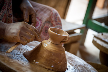 hands at work - pottery factory - Myanmar