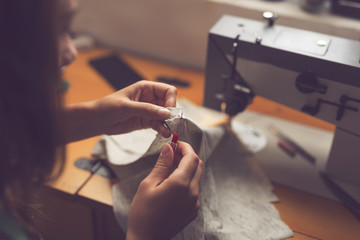 Seamstress making repairs