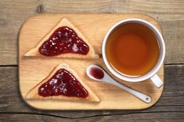 Tea and toasted bread with jam