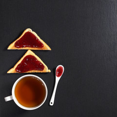 Toasted bread with jam and tea