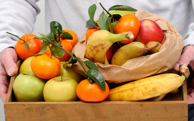 different fruits in wooden tray