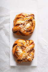 Sweet pastry cake on a white plate. Bakery product breakfast