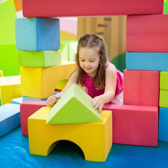Kids play. Construction toy blocks. Child toys