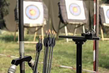 Equipment in sports archery against the background of targets, shanks of arrows, for sports bow.