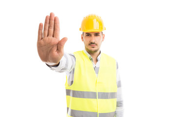 Engineer or architect showing palm as stop stay gesture sign.