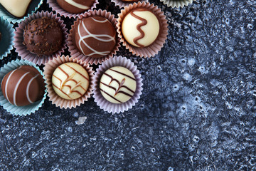 a lot of variety chocolate pralines, belgian confectionery gourmet chocolate.