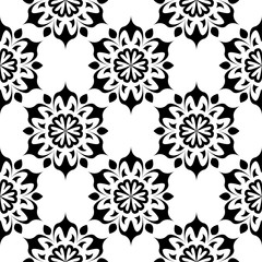 Black floral seamless ornament on white background