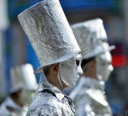 unrecognizable man wrapped with aluminium foil,