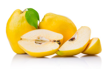 Ripe quince fruits with leaf and slice isolated on white