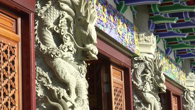 pan of carved dragons on po lin monestery, near the tan tian buddha statue, in hong kong, china