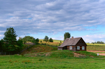 Fototapeta na wymiar Countryside. Rural home. Rural landscape.