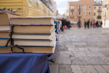 Old books at flea market at Tarragona, Catalonia, Spain
