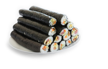 Plate with pile of sushi fresh maki rolls, isolated on white 