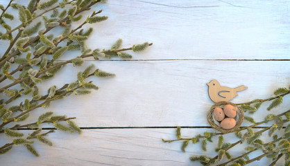 Branches on old wooden boards. Top view. A symbol of the rebirth of nature.