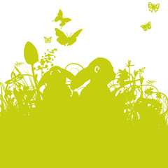 Kaninchen sitzen zu Ostern im Nest