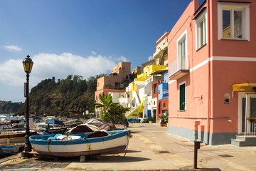 Fototapeta na wymiar Procida Island with colorful houses on Neapolitan Bay in Italy 