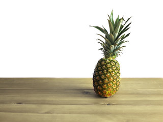 pineapple  on a wooden background isolated