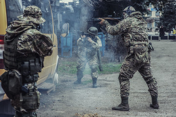 Fototapeta premium The storming of the bus with the terrorists