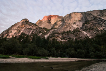 Photo of Half Dome in Yosemite National park during sunset.