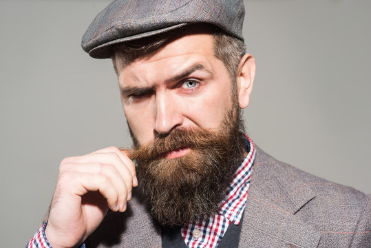 Bearded man. Retro model. Retro style. Bearded man in fashionable clothes. Retro clothes.