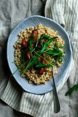 roast carrot and fregola salad..selective focus