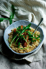 roast carrot and fregola salad..selective focus