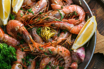 Many shrimps in a paella pan, cooking background