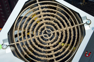 Dusty fan grille.