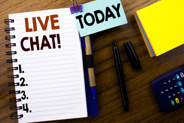 Word, writing Live Chat . Business concept for Communication Livechat written on book note paper on the wooden background. With attached today sign. Office top view.