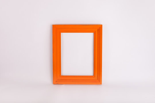 Orange picture frame on white background