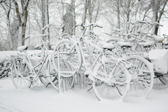 Bicycles covered with snow in winter