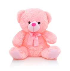 Fotobehang Cute pink bear doll with bow isolated on white background with shadow reflection. Playful bright pink bear sitting on white underlay. Teddy bear plush stuffed puppet with ribbon on white backdrop. © boitano