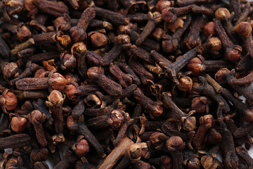 Obraz premium Pile of dry cloves background
