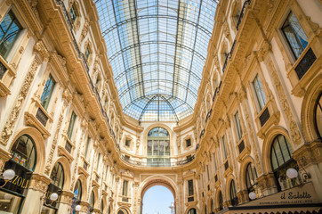 Obraz premium Vittorio Emanuele gallery in Square Piazza Duomo at morning, Milan, Italy.