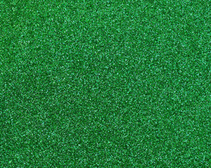 Fototapeta premium Green glitter texture abstract background close up
