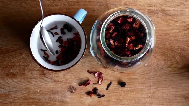 Tea made from dried fruits in a spoon. Brew delicious tea.