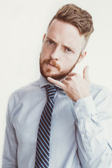 Serious Business Man Making Call me Gesture