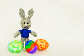Easter bunny with colorful eggs