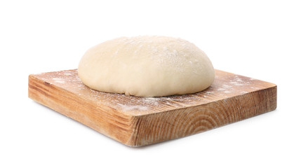 Wooden board with raw dough on white background