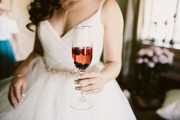 bride holding champagne