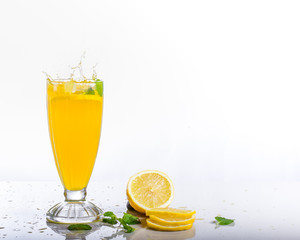 refreshing lemon tea with mint on white background and copy space.