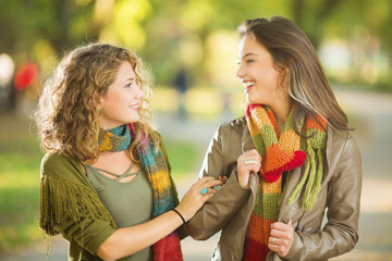 Girfriends in park talking