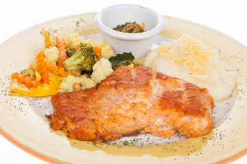 roasted salmon fillet with vegetables and potato puree