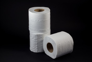 toilet paper isolated on black background.