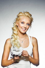 portrait of young smiling woman with thick blond hair and natural clean skin. Beautiful girl wreath on her head