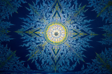 Beautiful wall and ceiling paintings in thai fine art pattern at Wat Rong Suea Ten Temple, locate at Chiang Rai province, northern part of Thailand.